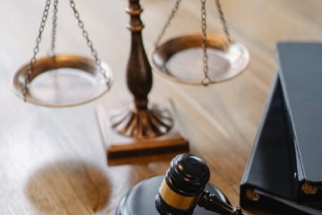judges desk with gavel and scales